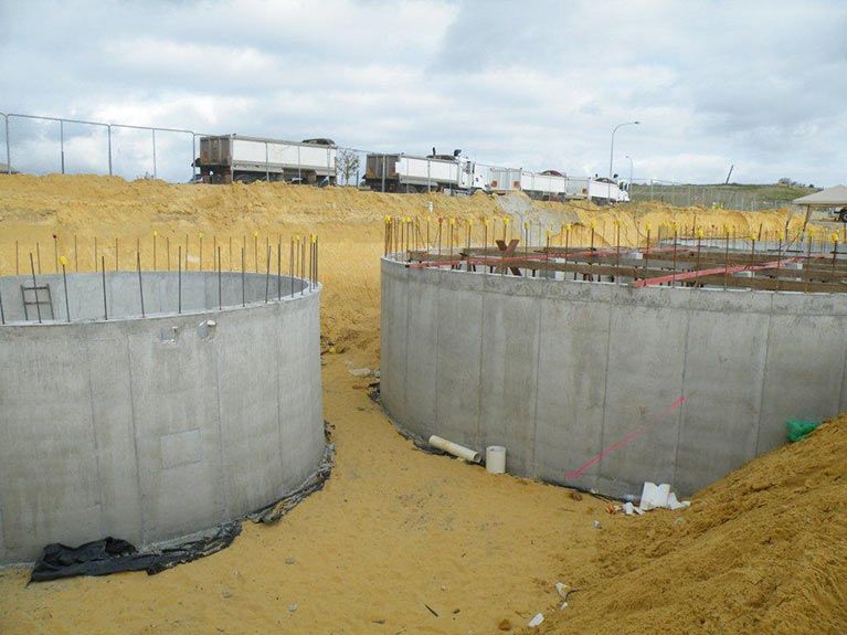 Two Large Concrete Tanks Are Being Built In A Dirt Field – Perth, WA - Armadale Concrete Tank Co.