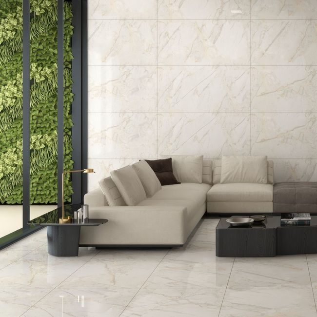 A living room with a couch and two coffee tables