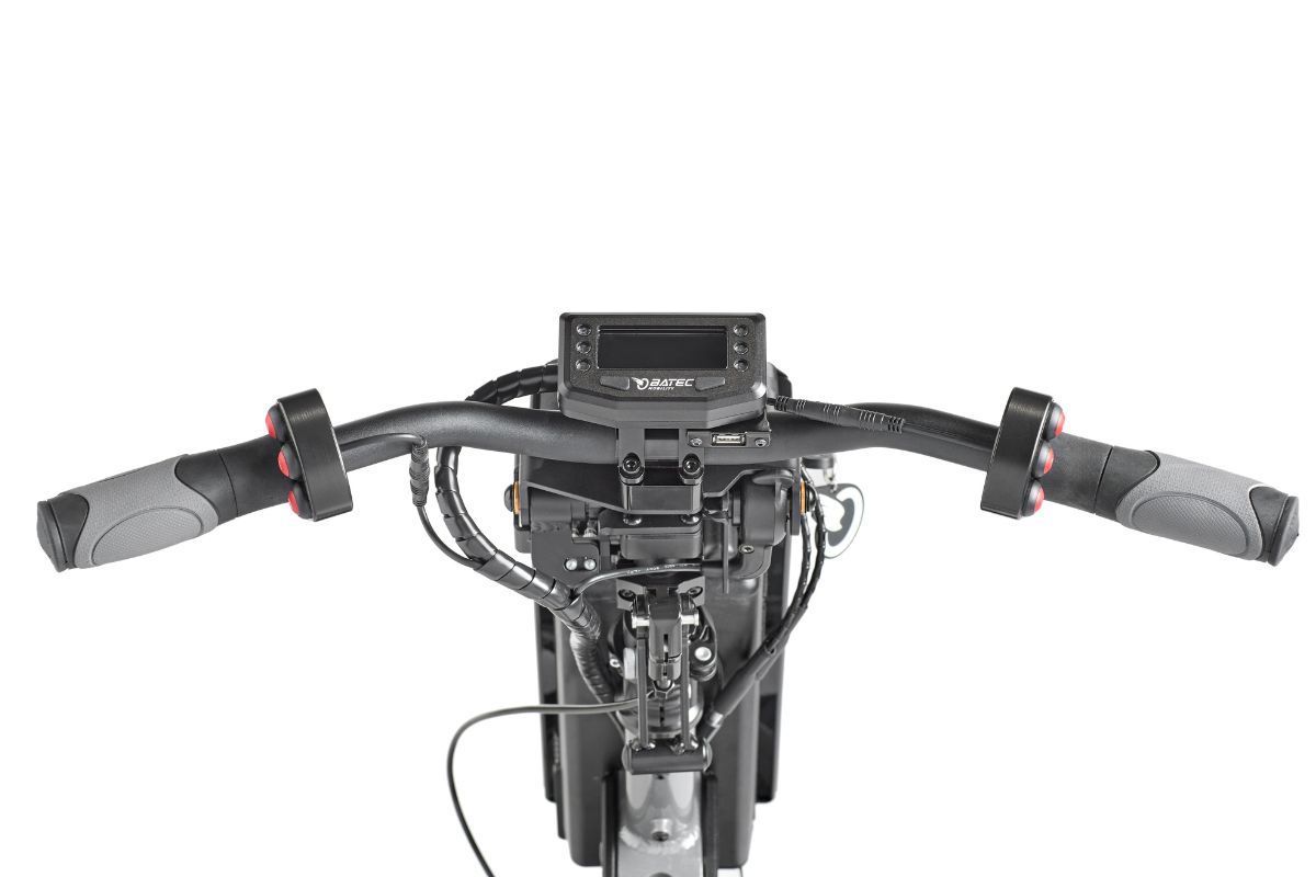 Black electric scooter handlebars with display, controls, and grips against a white background.