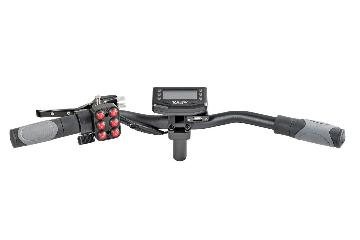 Black electric bicycle handlebars with display, red control buttons, and grey grips.