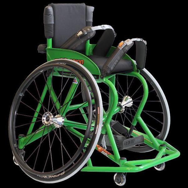 Green wheelchair with large black wheels on a black background.