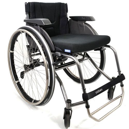 Black and silver wheelchair with large wheels and black seat cushion.
