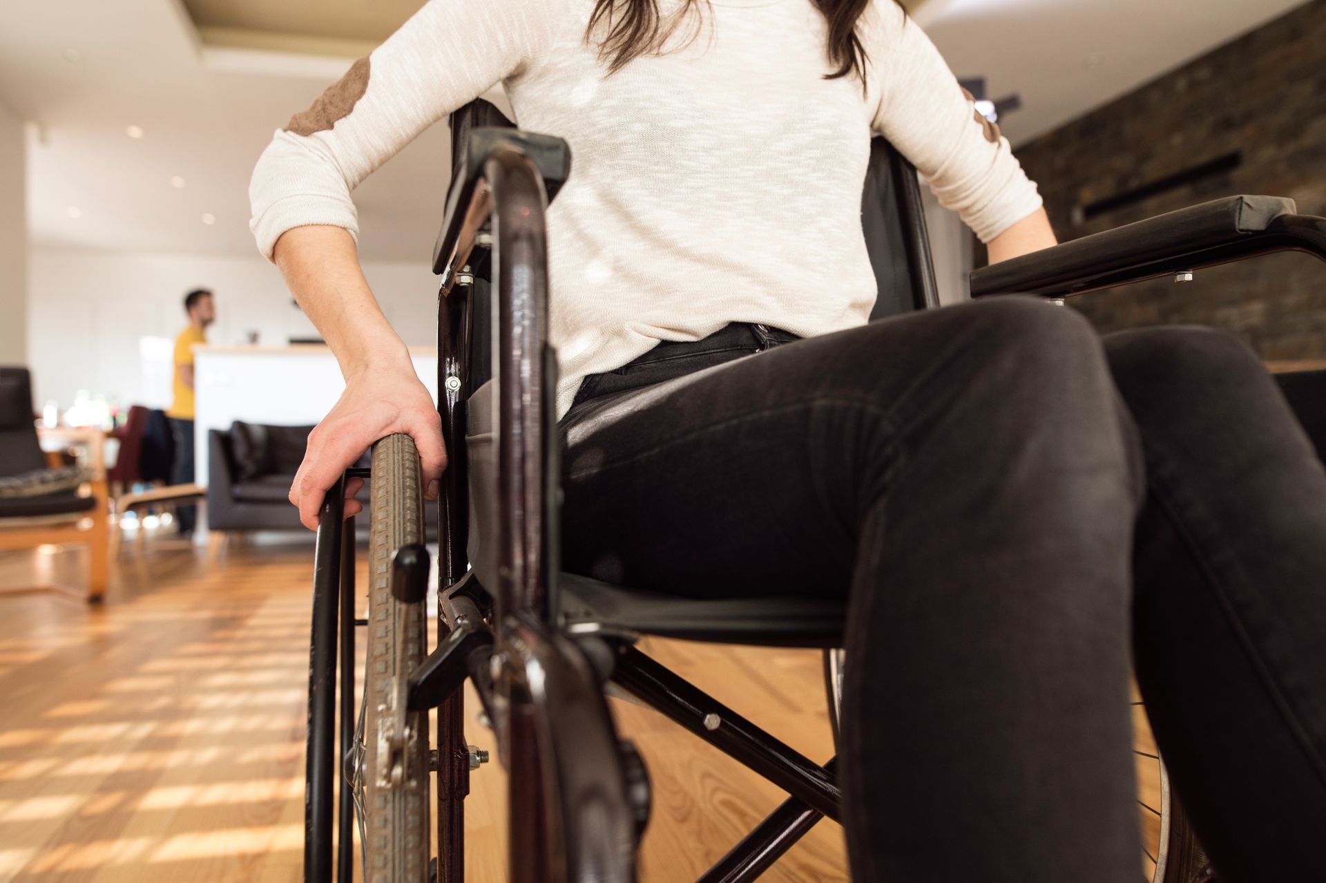 Woman using a wheelchair - Mogo Wheelchairs
