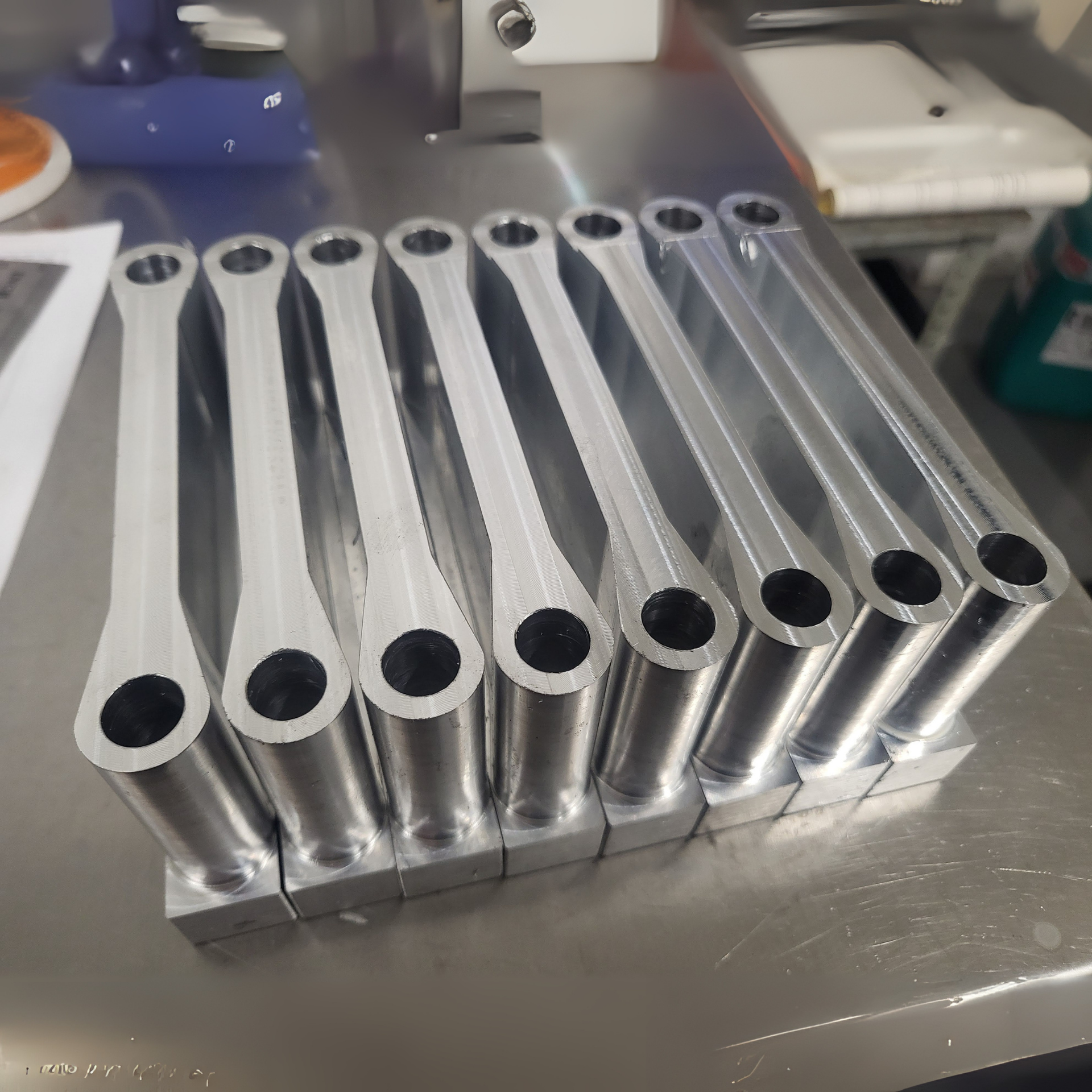 A bunch of metal tubes with holes in them