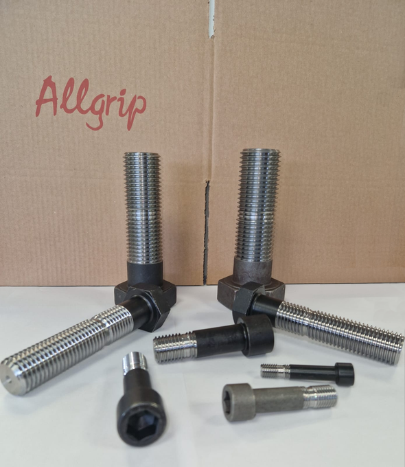 A cardboard box with the word allgrip on it