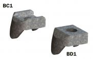A couple of concrete blocks with holes in them on a white background.