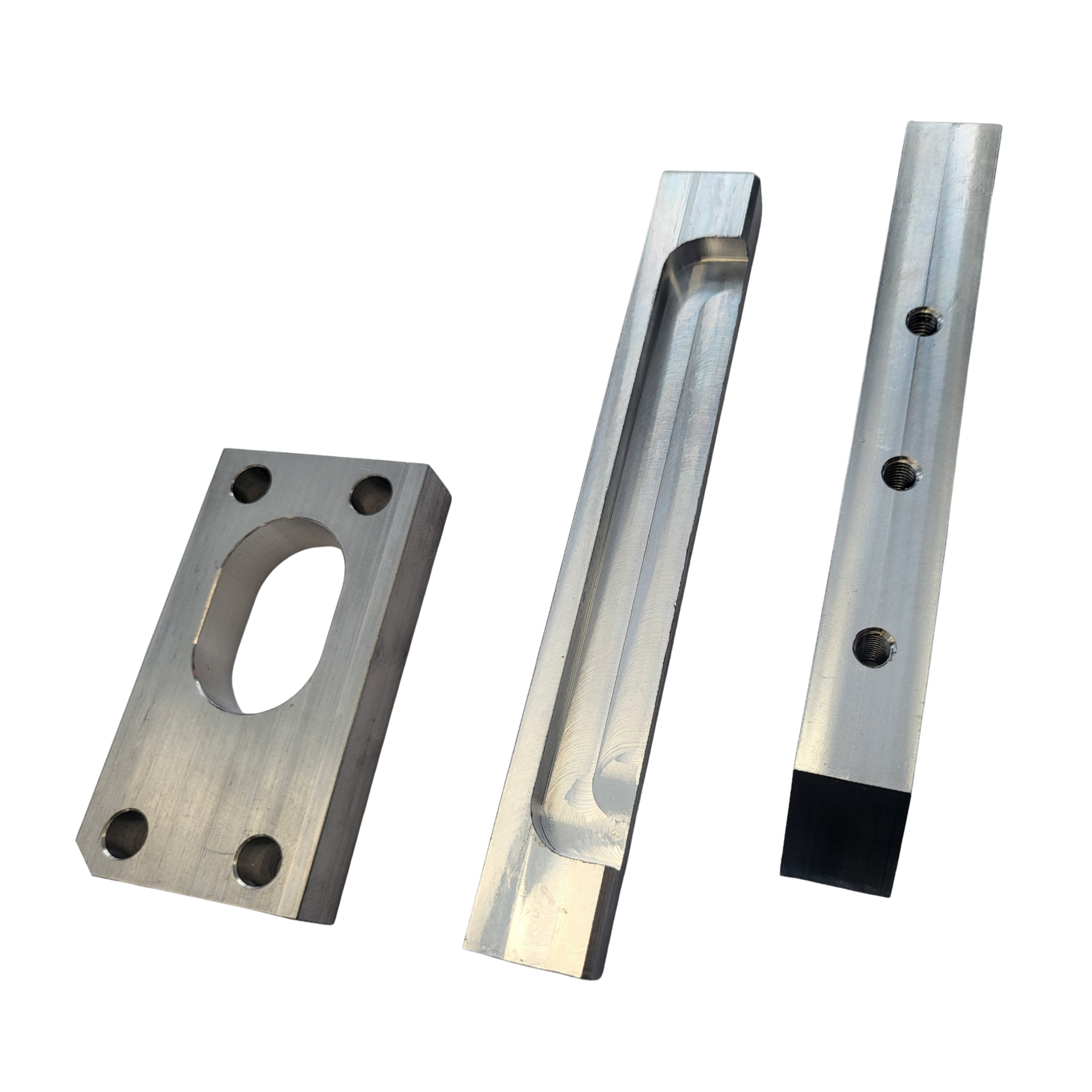 Three pieces of metal with holes in them on a white background.