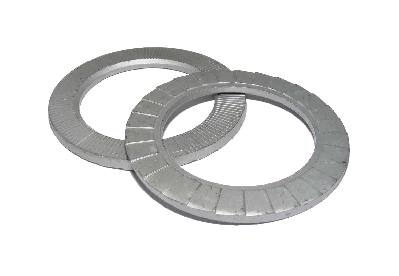 Two washers are stacked on top of each other on a white background