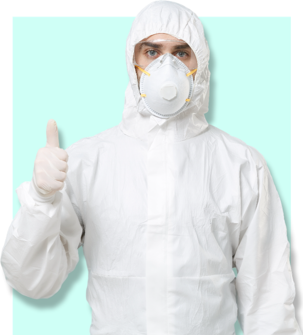 a man wearing a protective suit and mask is giving a thumbs up