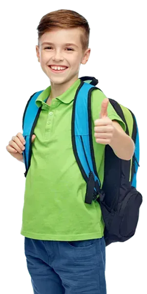 A young boy with a backpack is giving a thumbs up.