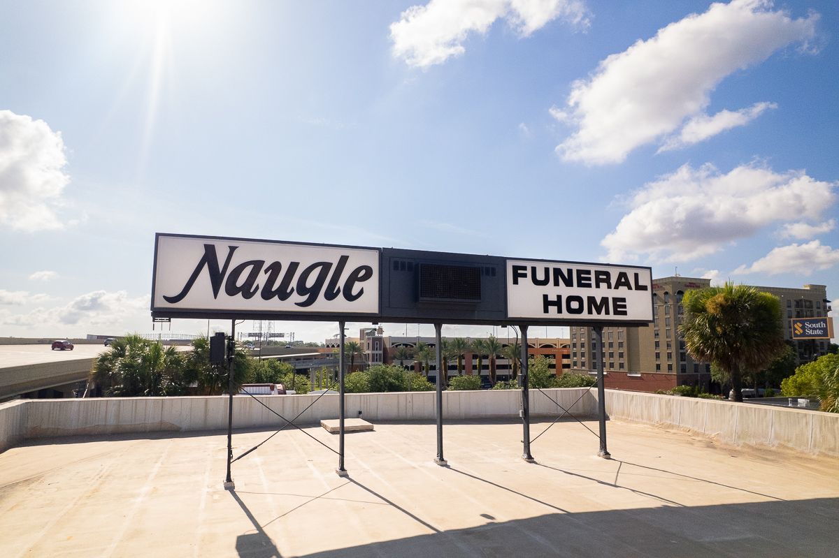 A photo of Naugle Fuenral Home and Cremation Services' sign