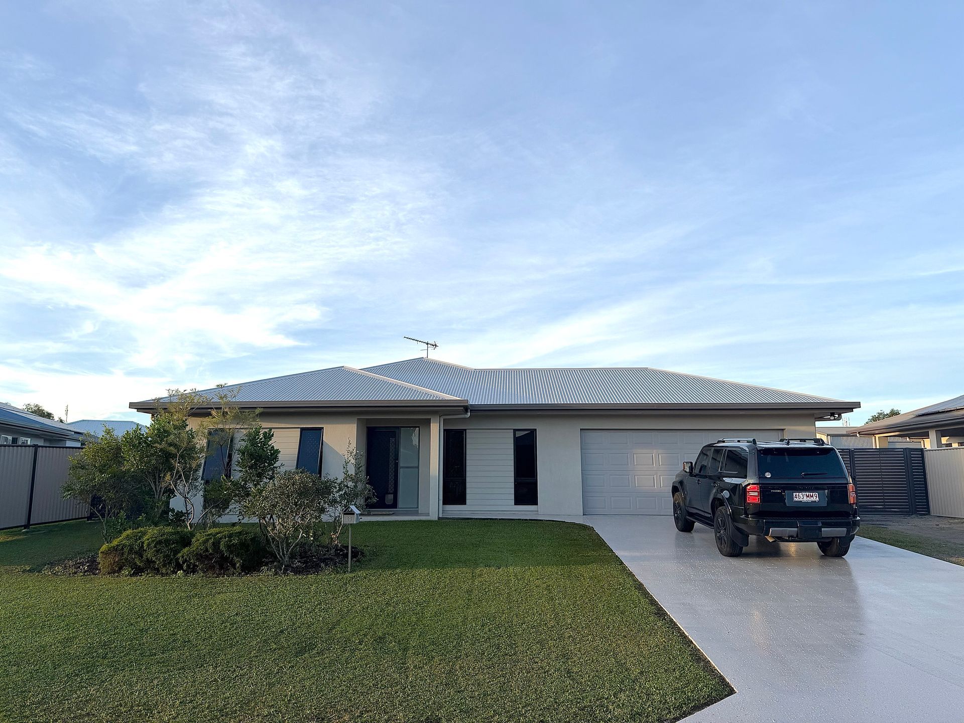 Single-story House With a Grey Roof, Front Lawn — All Grind & Coat in Cairns, QLD
