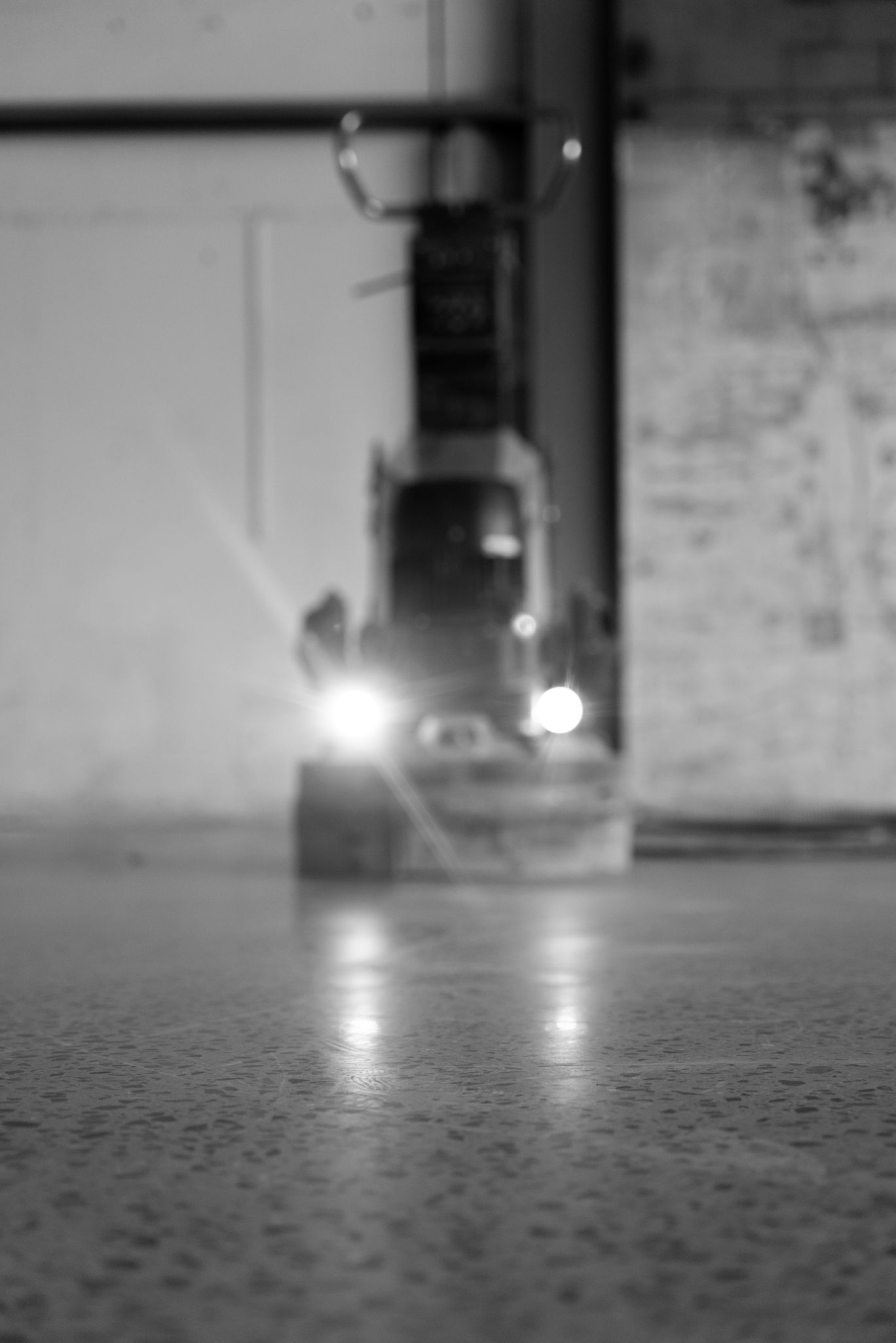 Forklift With Headlights on in a Warehouse — All Grind & Coat in Cairns, QLD