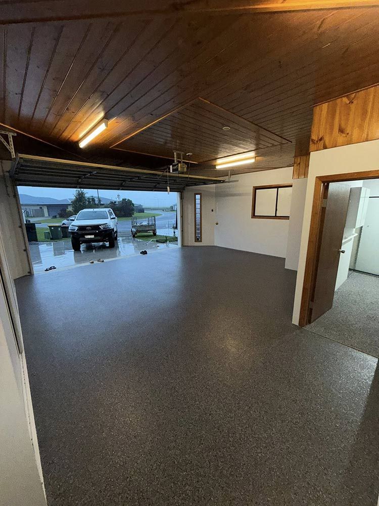 Dark Speckled Epoxy Floor, Driveway — All Grind & Coat in Cairns, QLD