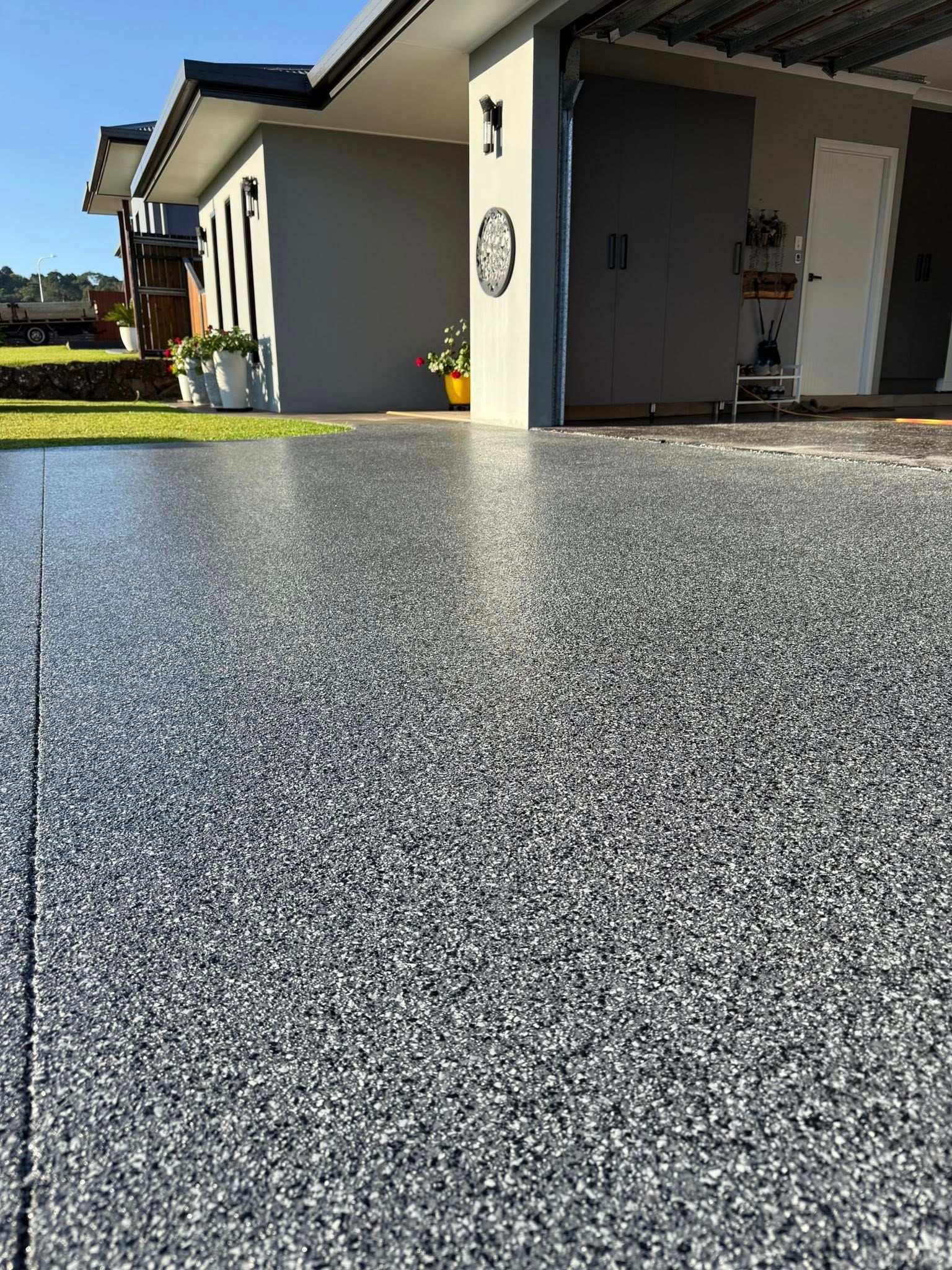 A Modern House With a Freshly Applied Grey — All Grind & Coat in Cairns, QLD