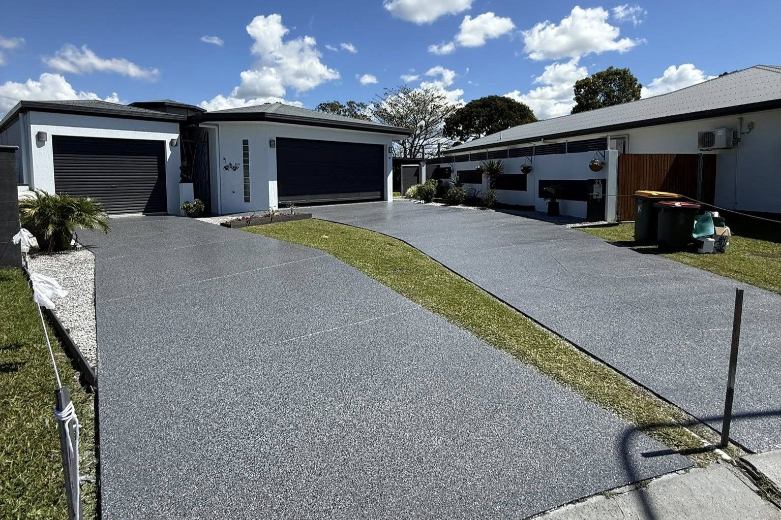 A Driveway With Polished Concrete All Grind & Coat in Atherton, QLD