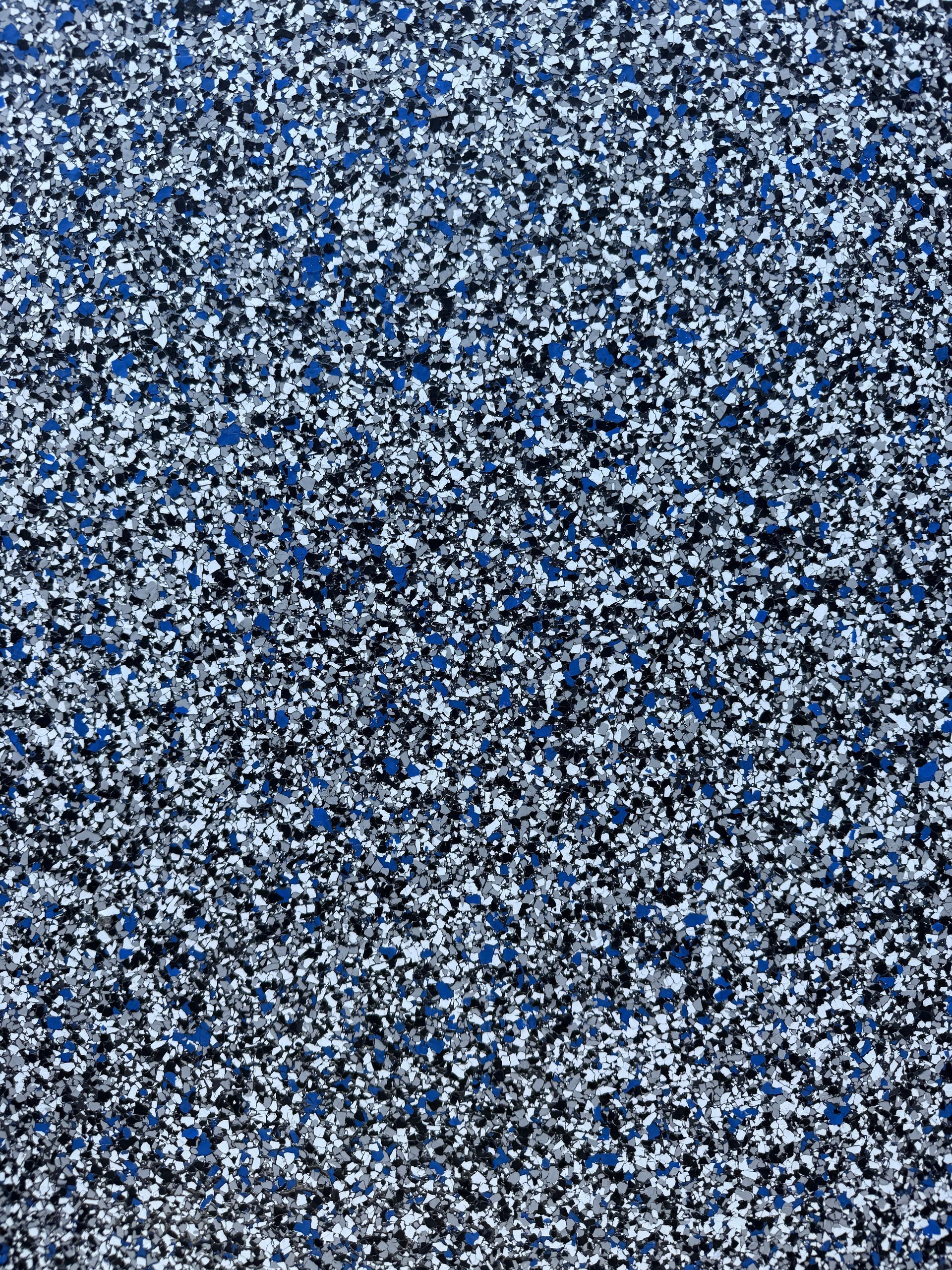 Blue and White Speckled Floor Surface — All Grind & Coat in Cairns, QLD