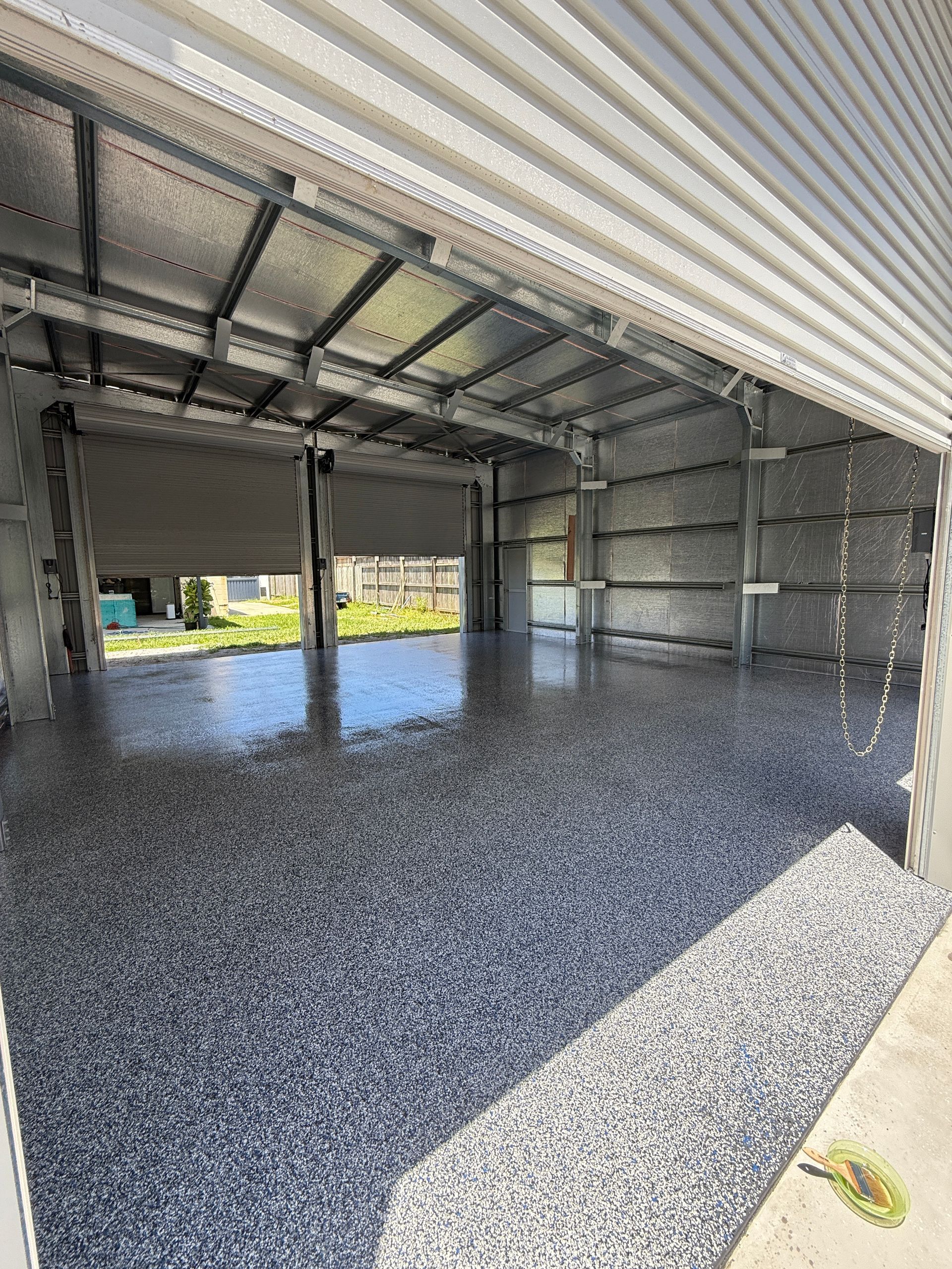 Inside of a Metallic Building With Epoxy Flooring — All Grind & Coat in Cairns, QLD