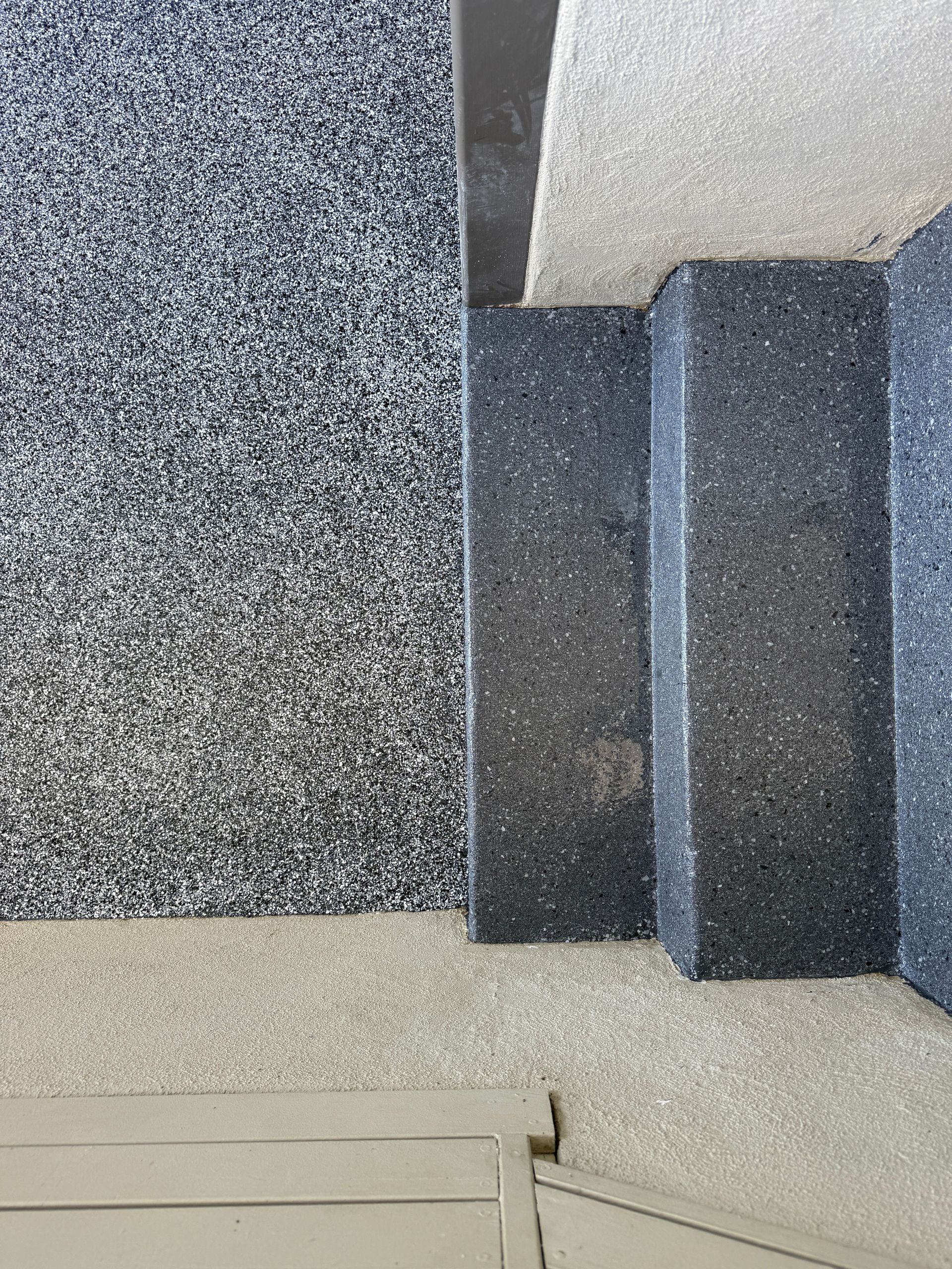 Tiled Stairs With a Textured, Speckled Surface — All Grind & Coat in Cairns, QLD