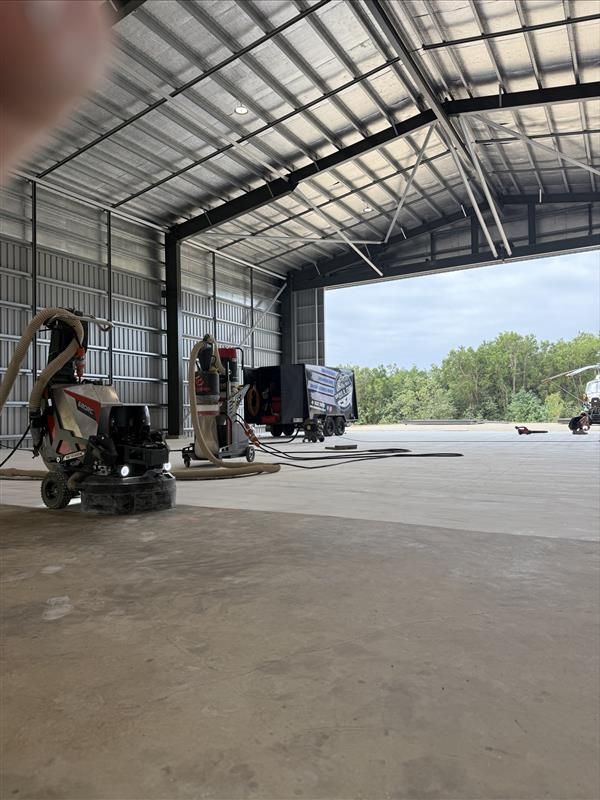 Large Metal Workshop Interior With Concrete Floor — All Grind & Coat in Mareeba, QLD