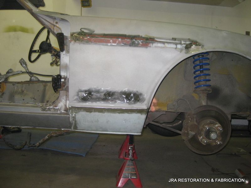 A car is being restored by jra restoration & fabrication
