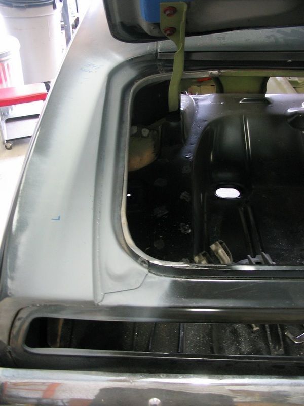 The back of a car with the trunk open