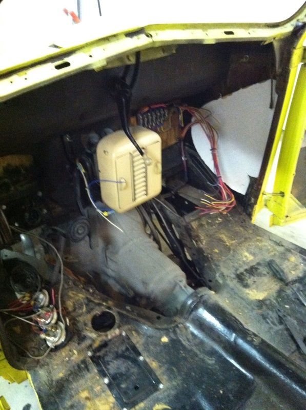 The inside of a car with a box that says ' amp ' on it