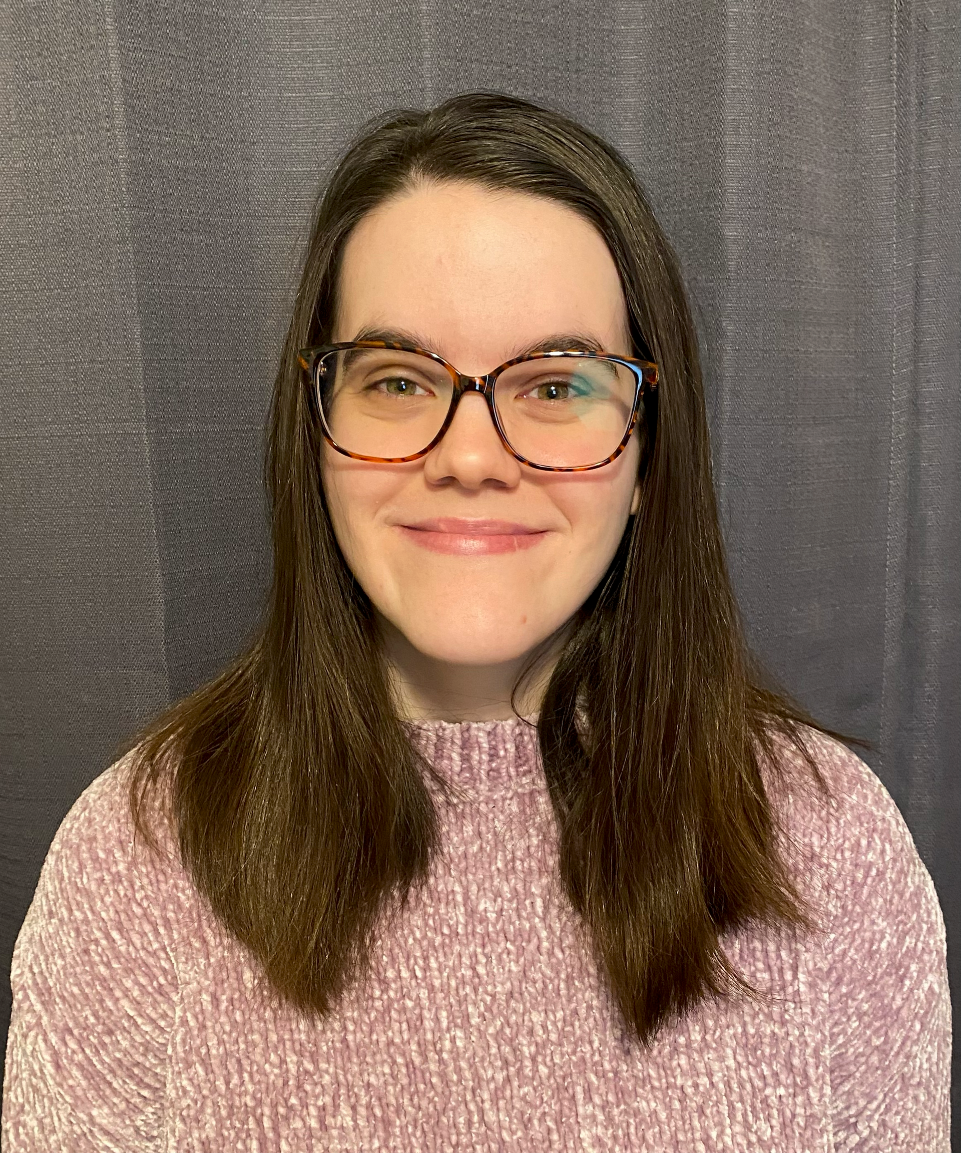 Katie McMahon, Deaf social worker, specializes in therapy for the Deaf community, focusing on mental health and trauma.