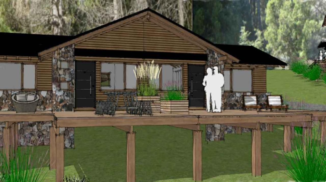 Representación en 3D de una cabaña rústica con terraza de madera, base de piedra y dos figuras de pie frente a la puerta principal.