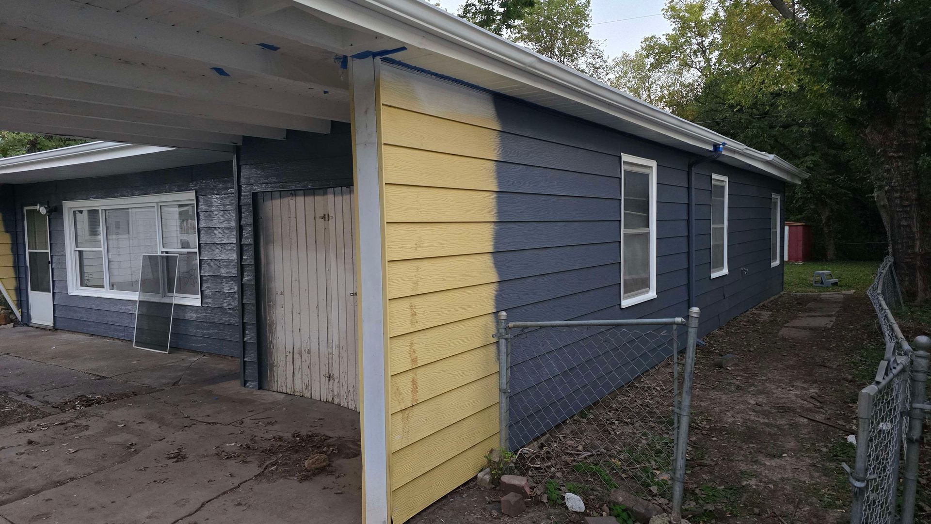 Washing and painting old siding