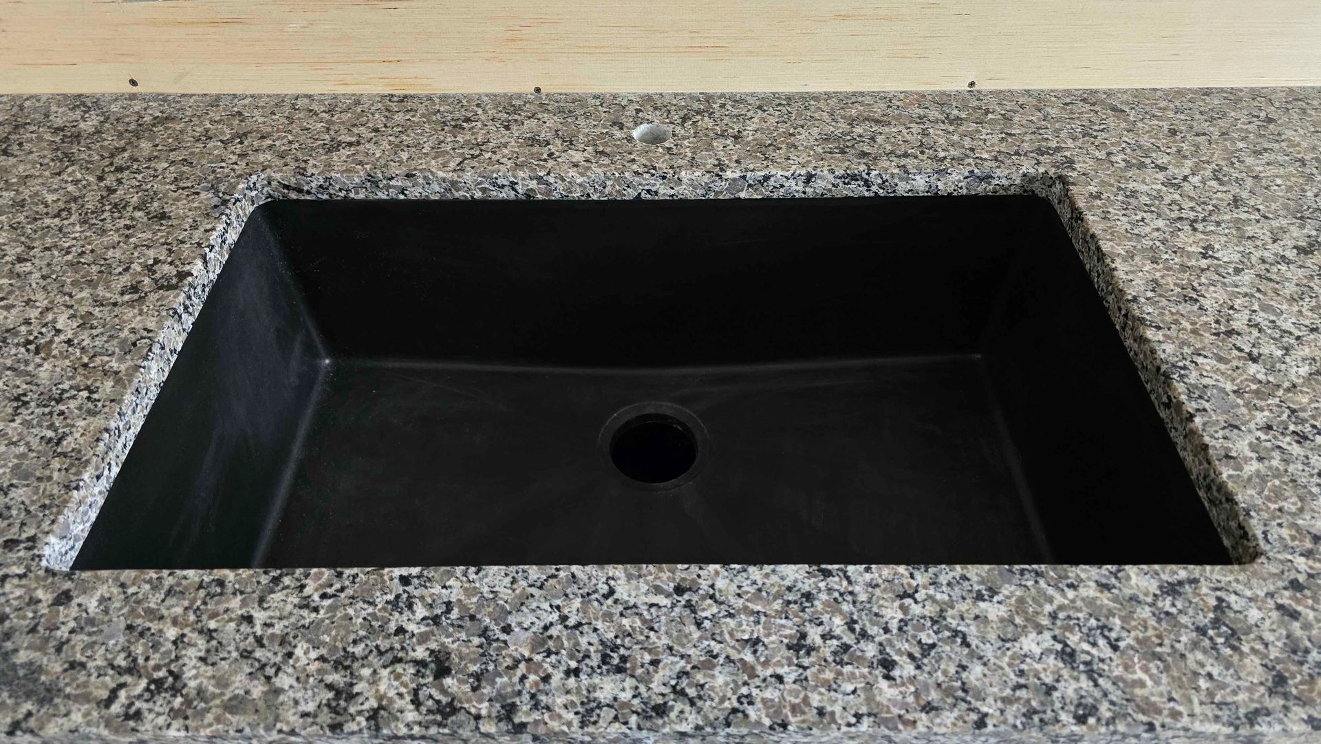 Countertop Installation of dark mottled counter