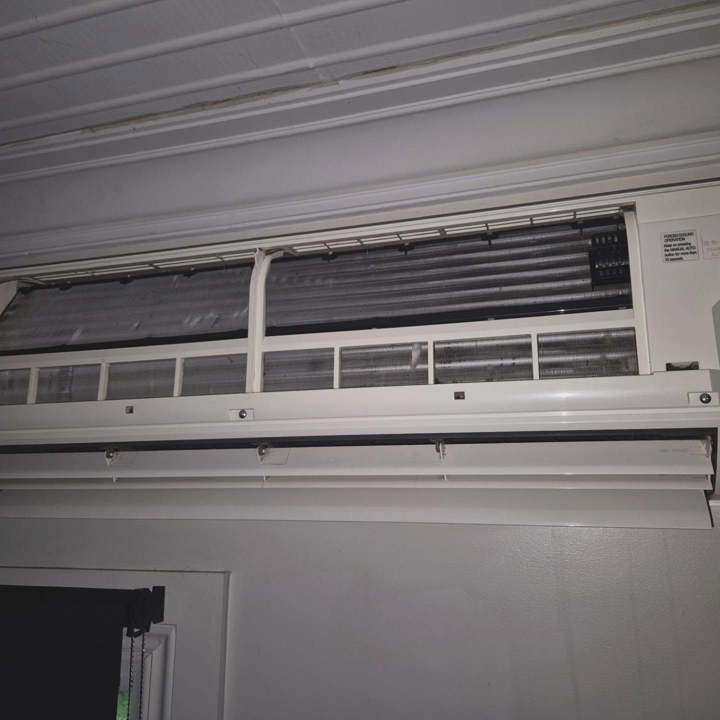White Air Conditioning Unit Mounted on a Wall — Frosty Solutions Air Conditioning In Mudgee, NSW