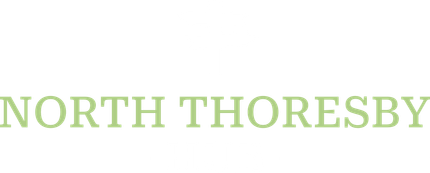 Green text reading “NORTH THORESBY” on a white background