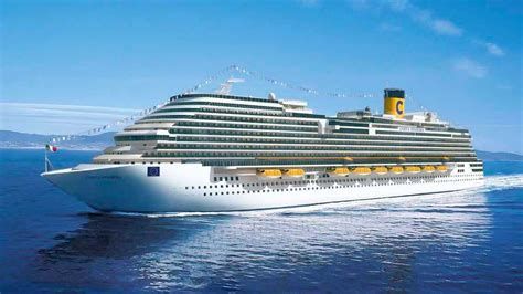 Large white cruise ship sailing on calm blue ocean under a clear sky