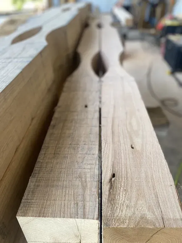 A close up of a piece of wood sitting on top of a table.