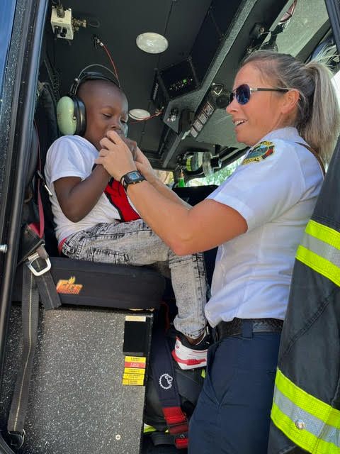 child with fire fighter 2