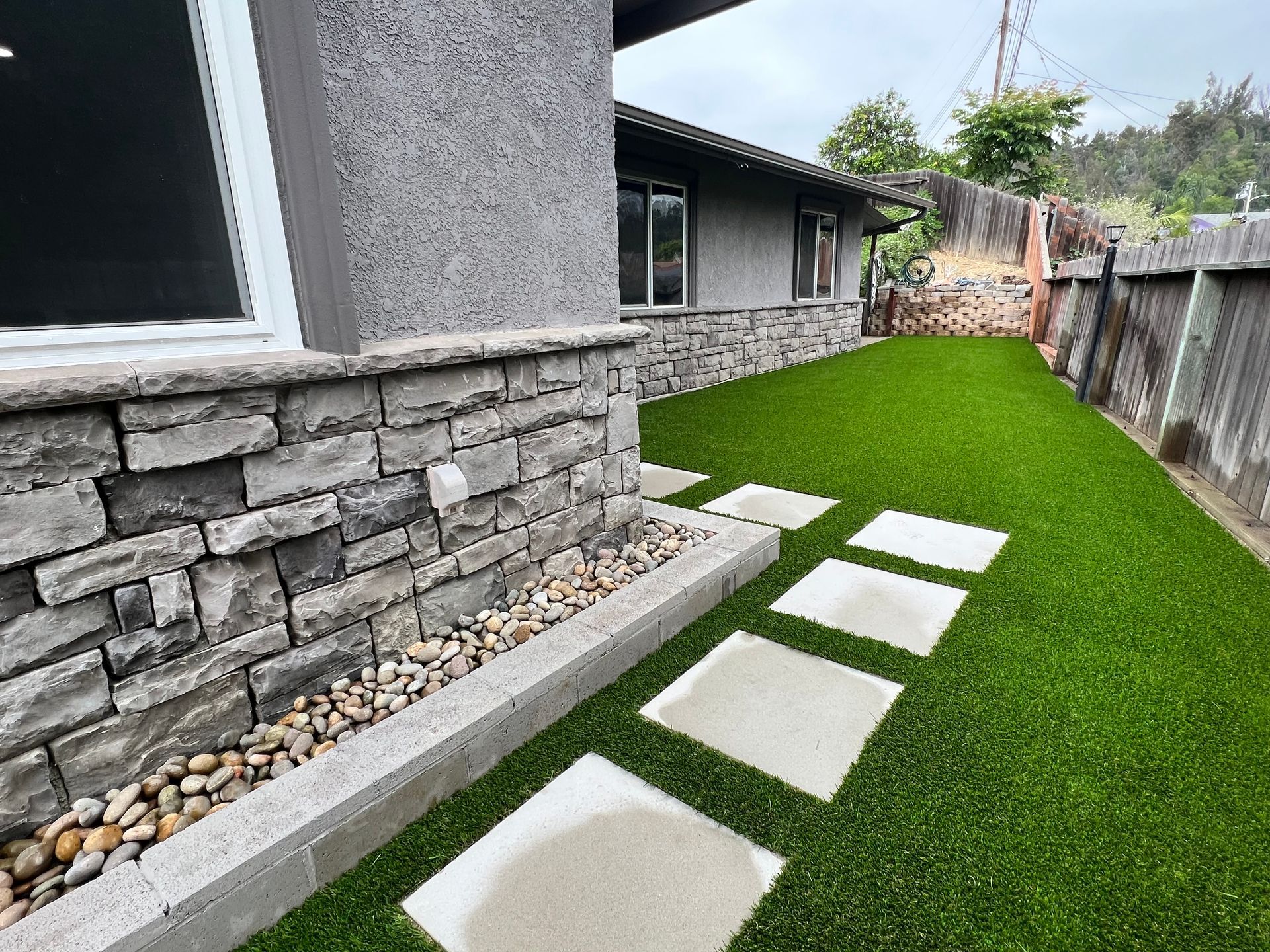 New synthetic grass and pavers