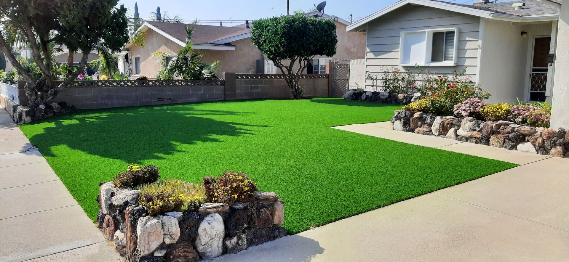 front yard with new fake grass