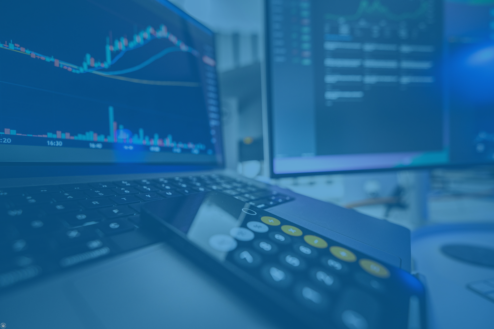 Displaying market charts beside a calculator, representing revenue analysis for direct suppliers.