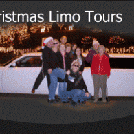 Group posing beside a white limousine at night with Christmas lights in the background