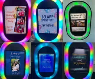Six glowing LED plaque displays with colorful quotes on a black background.