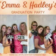 Emma & Hadley's graduation party photo booth with six friends holding props and signs, smiling together