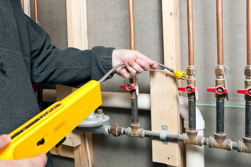 Man Using Leak Detector — Petaluma, CA — Leak Detection Pros Man Using Leak Detector — Petaluma, CA — Leak Detection Pros