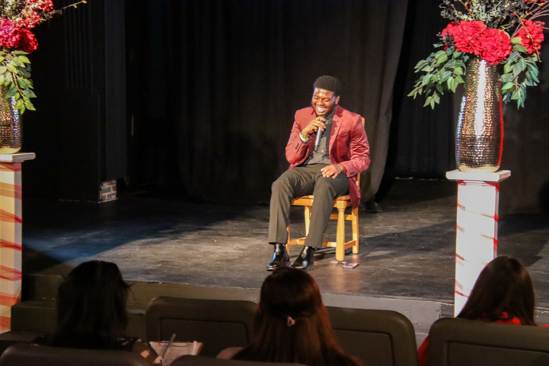 DeAaron Robinson laughing on stage.