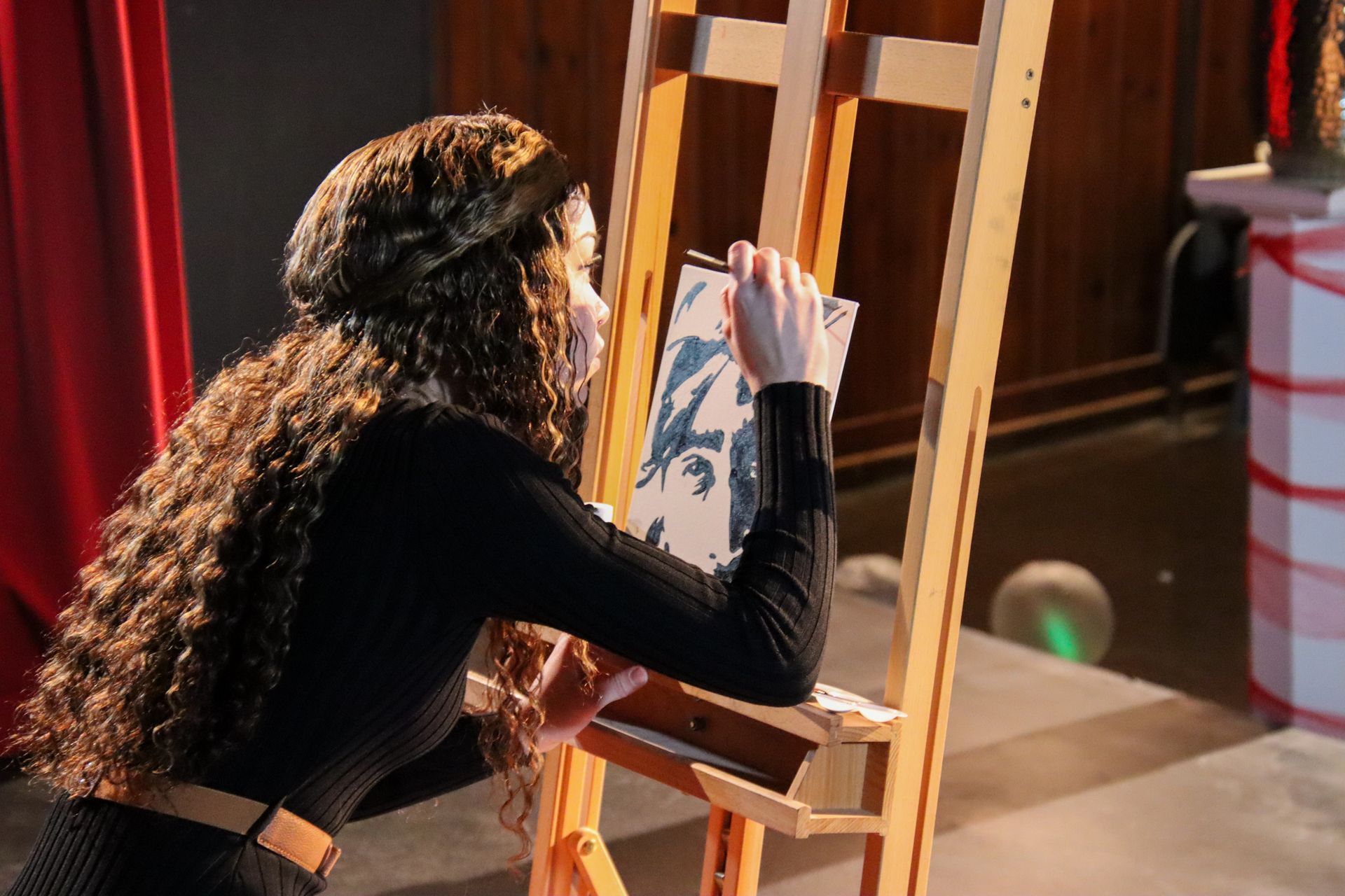 Teychiana Dornan paints a picture of Tupac Shakur.