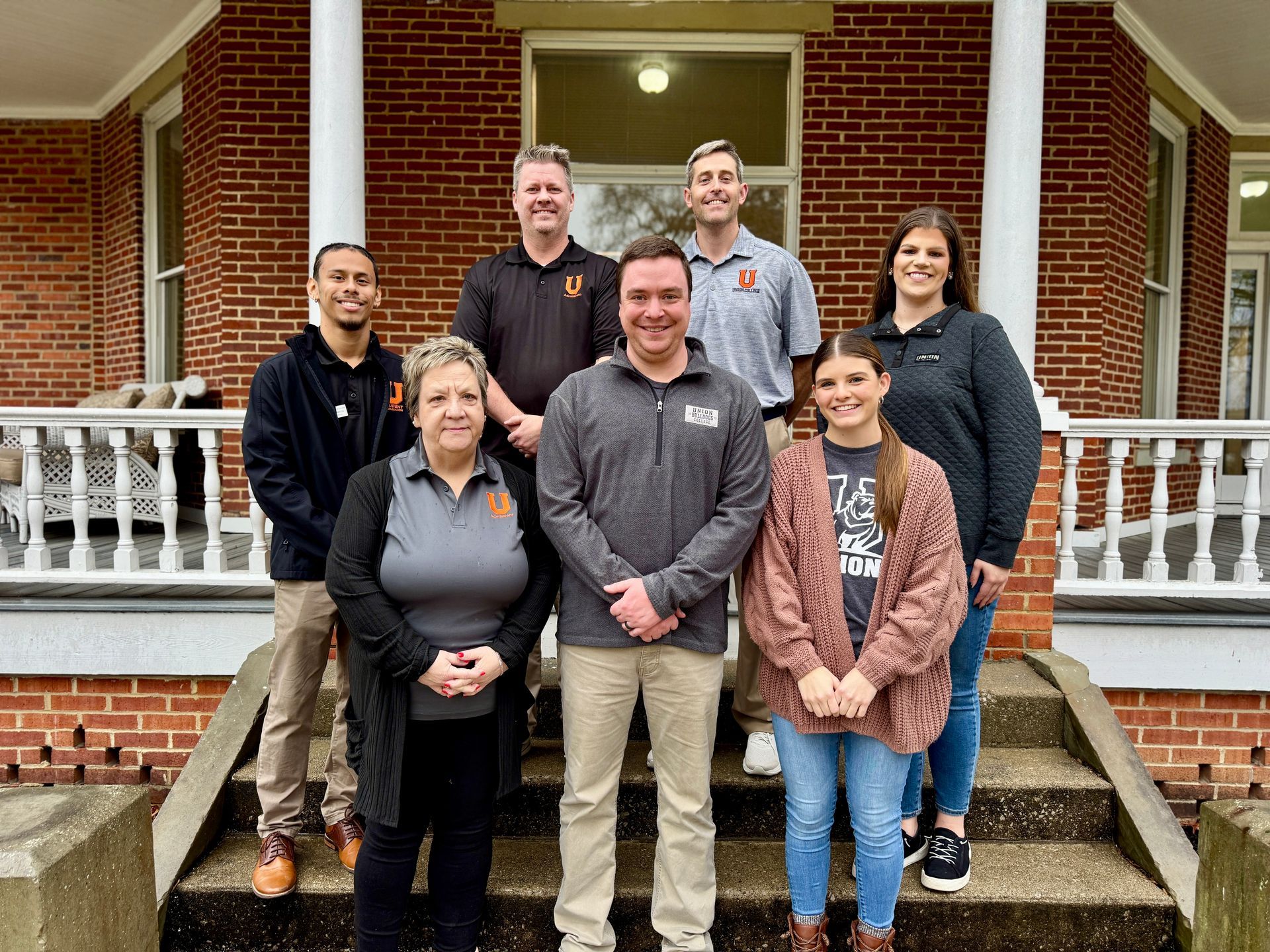 Undergraduate admissions team gathered in front of Speed Hall.