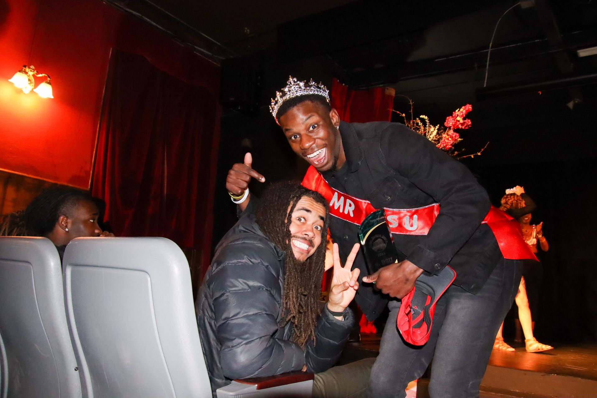 Mr. BSU Nijah Smith celebrating with a friend.
