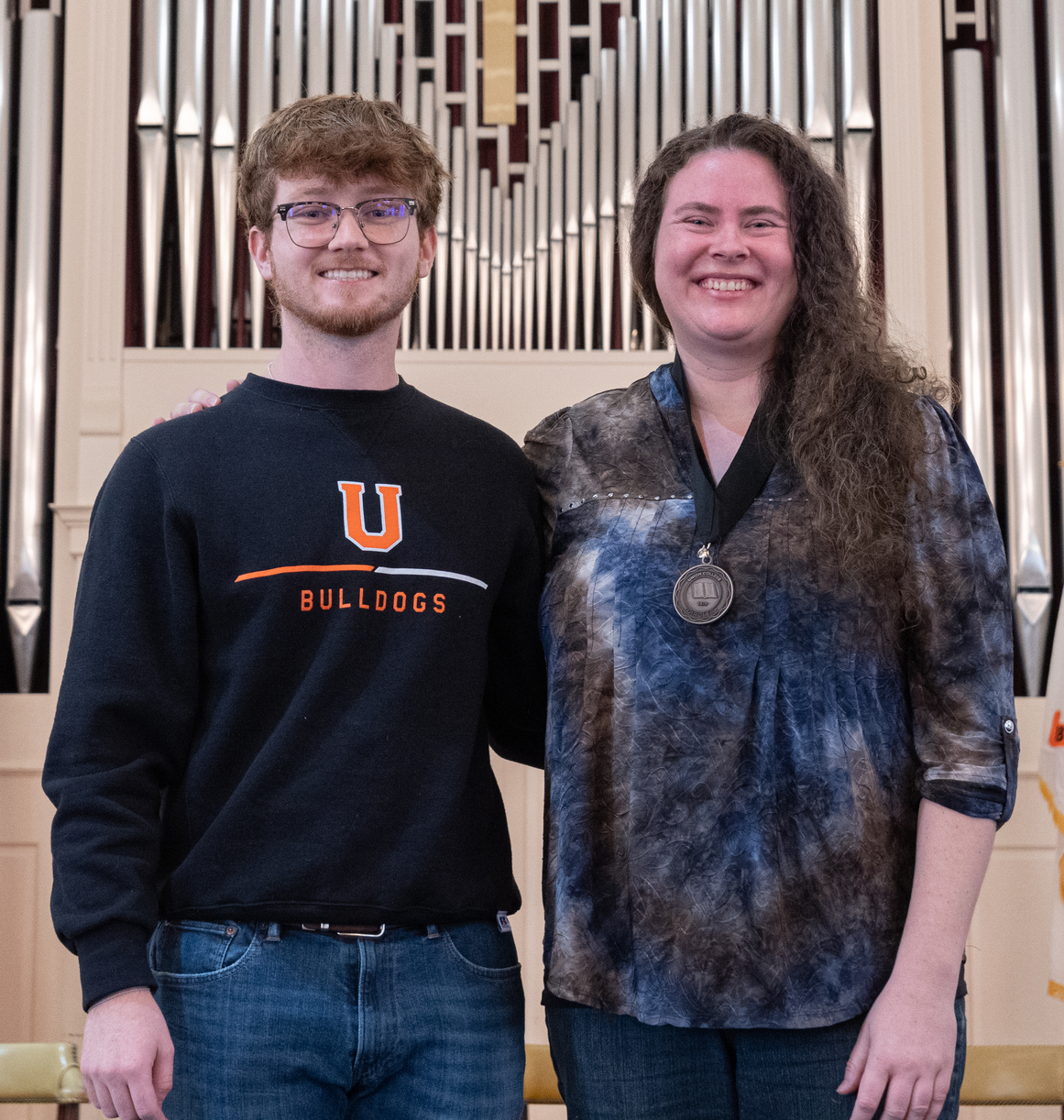 Ethan Heck and Libby Megna. Libby is wearing the CIRCLES medallion awarded by Ethan.