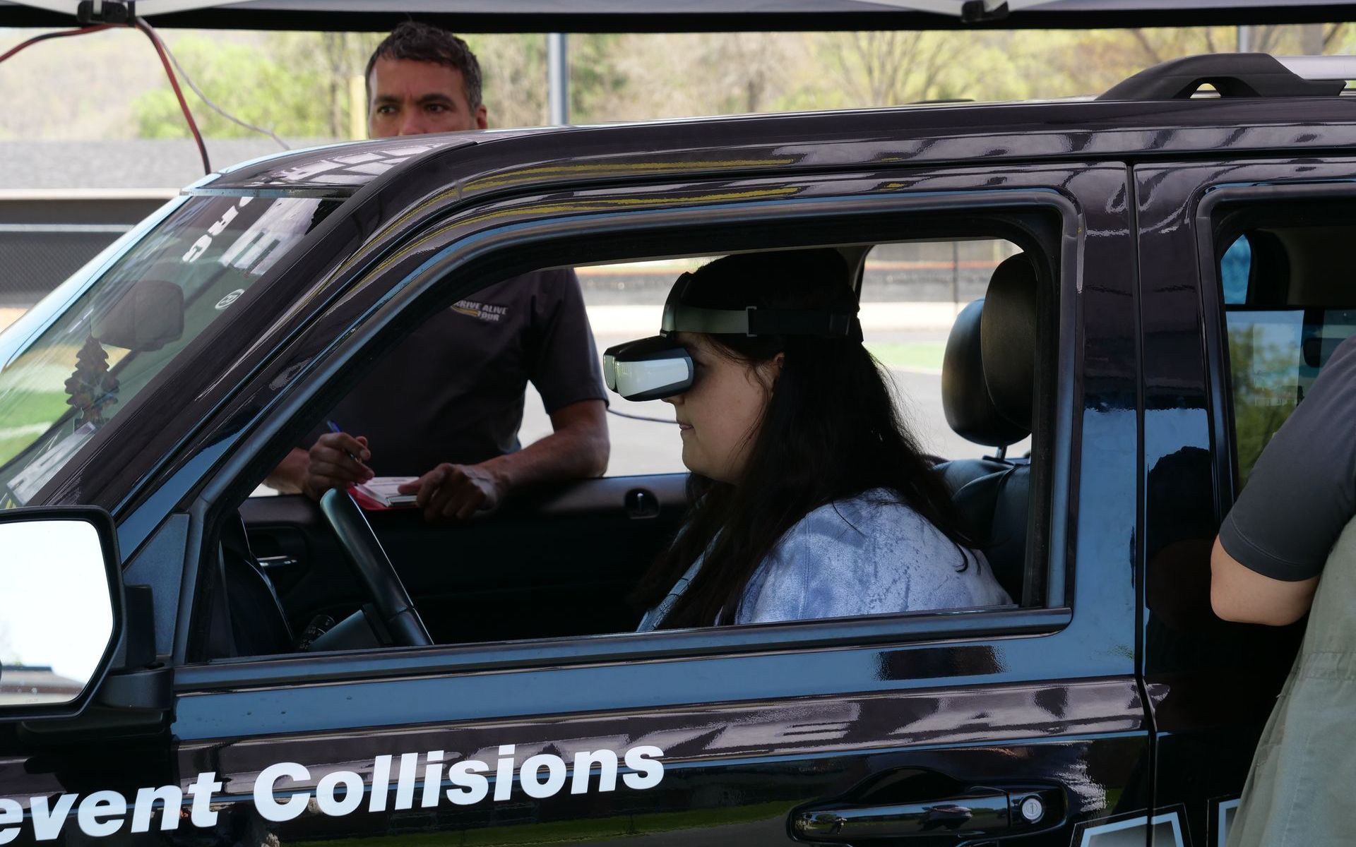 Junior Rachel Engle taking part in the simulated driving experience of the Arrive Alive Tour.