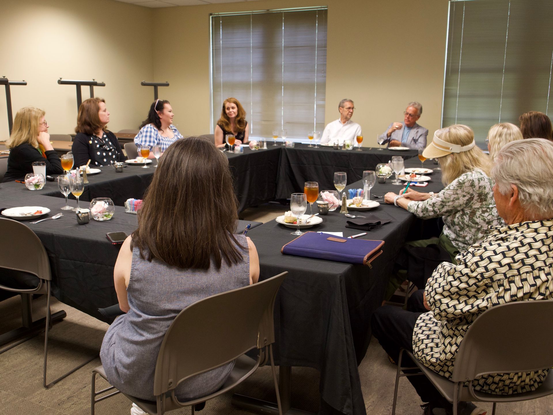 Room of individuals chatting about Union and the community.